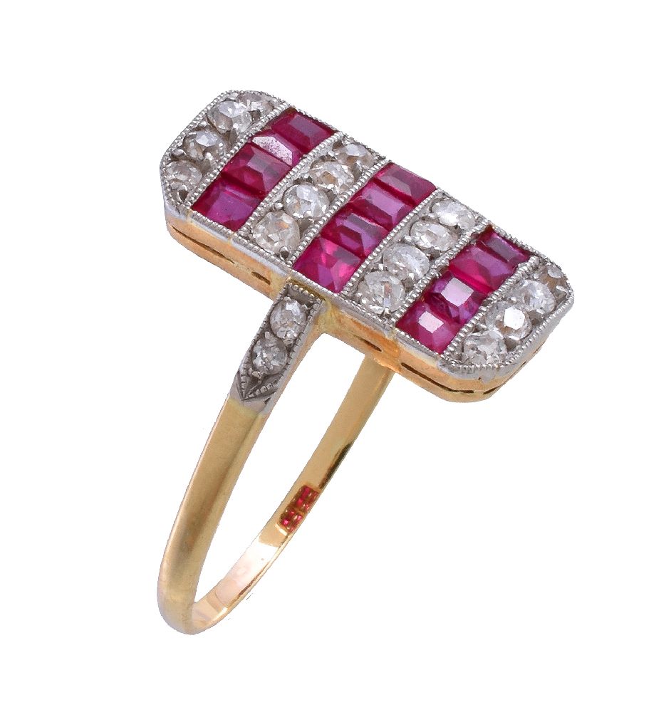 An early 20th century ruby and diamond panel ring, the rectangular panel set with alternating old