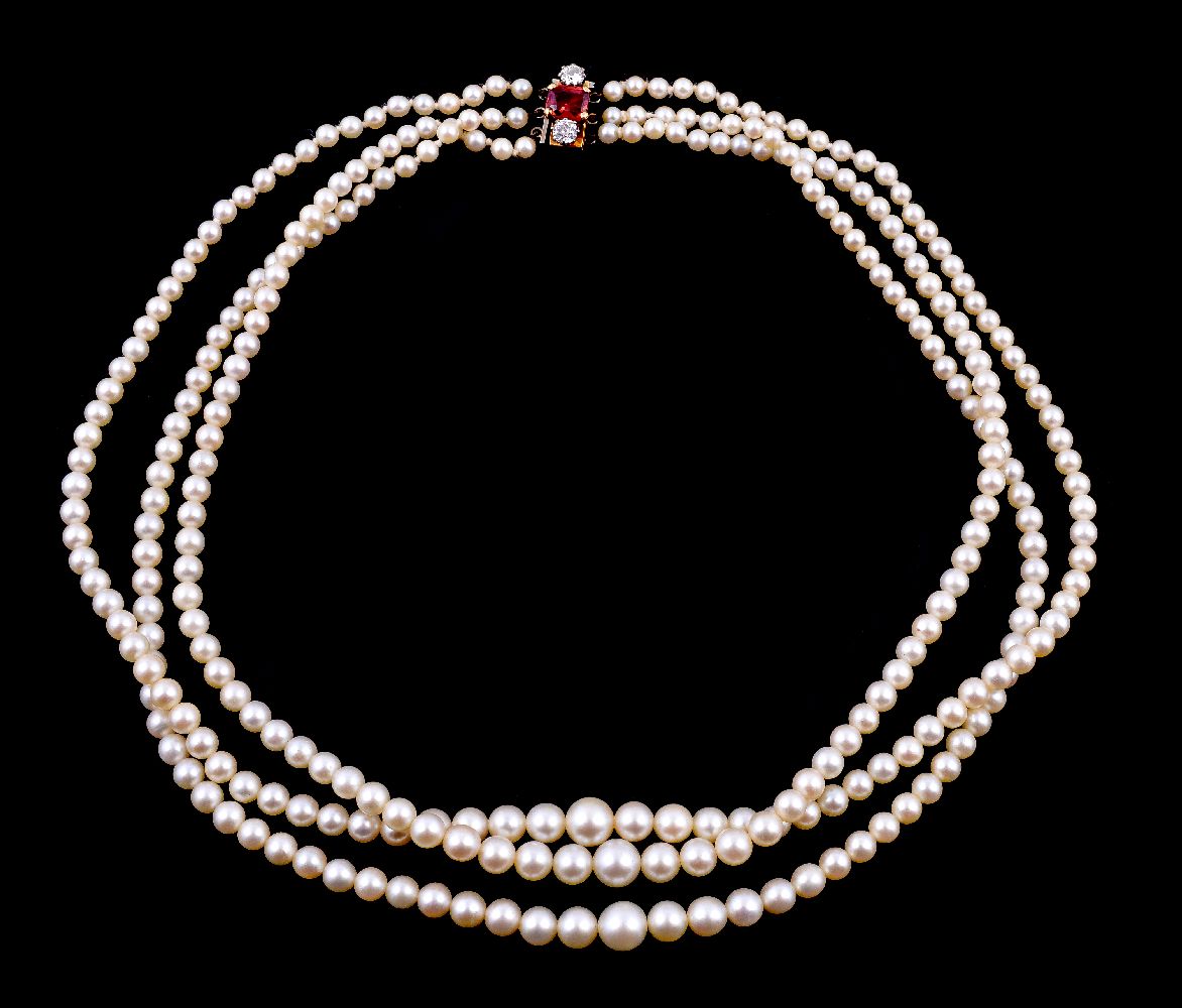 A three strand cultured pearl necklace, composed of graduating cultured pearls, measuring 3mm to