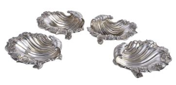 A set of four early Victorian shell shape butter dishes by Edward I, Edward II, James and William