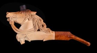 A meerschaum cheroot pipe, late 19th century, carved as a horse's head, a dog's head beneath, with