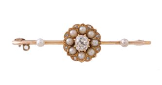 A late Victorian diamond and half pearl cluster bar brooch, circa 1890, the flower head cluster with