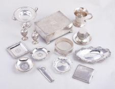 A collection of silver items, including: a twin handled small tazza by S. W. Smith & Co., Birmingham