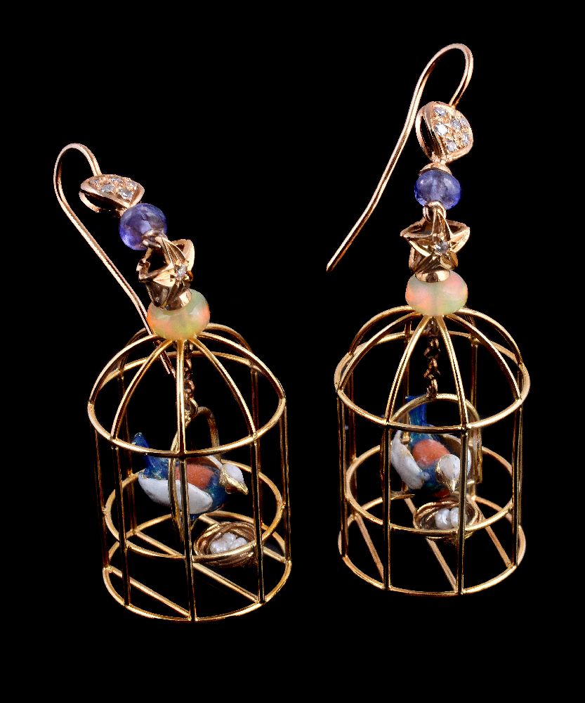 A pair of enamel and gem set birdcage earrings, the openwork birdcage enclosing an enamelled bird on