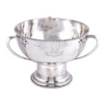 A silver circular pedestal punch bowl by The Goldsmiths and Silversmiths Co. Ltd, London 1913,