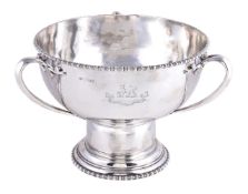 A silver circular pedestal punch bowl by The Goldsmiths and Silversmiths Co. Ltd, London 1913,