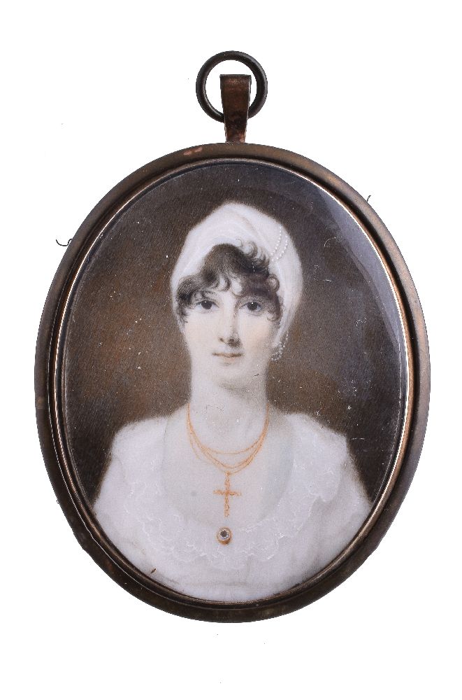 ϒ English School (circa 1820) Portrait of a lady dressed in white with a white cap and gold cross on