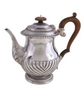 ϒ A late George III silver small coffee pot by Rebecca Eames & Edward Barnard I, London 1819, with a