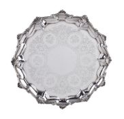 A Victorian silver shaped circular salver by Alexander Macrae, London 1859, with a shell and