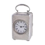 A late Victorian silver cased desk clock by Charles Payton, Birmingham 1898, the 1 1/4in white