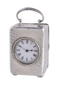 A late Victorian silver cased desk clock by Charles Payton, Birmingham 1898, the 1 1/4in white