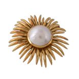 A mabé pearl sunburst brooch, the central 18mm mabé pearl collet set within a radiating polished