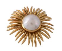 A mabé pearl sunburst brooch, the central 18mm mabé pearl collet set within a radiating polished