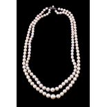 A mid 20th century two strand cultured pearl necklace by Mikimoto, the two strands composed of