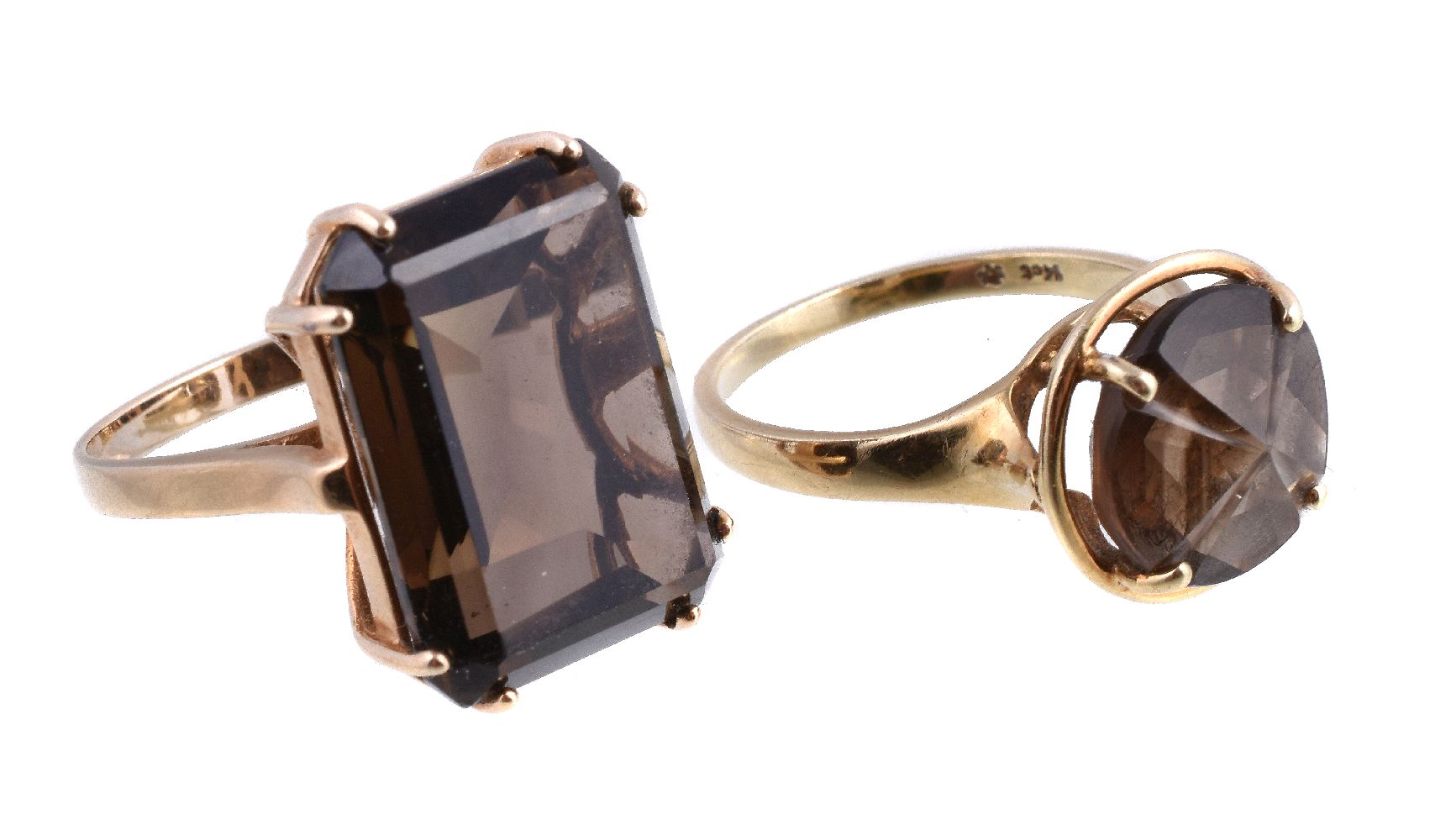 A 1970s smoky quartz dress ring, the rectangular cut smoky quartz in a claw setting, stamped 14kt,
