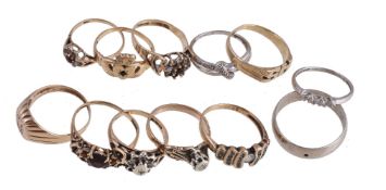A collection of gold coloured rings, to include a 9 carat gold Claddagh ring; a 9 carat gold diamond