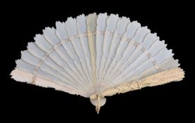 ϒ A European ivory brisé fan, mid 19th century, the guards carved as a sheaf of corn