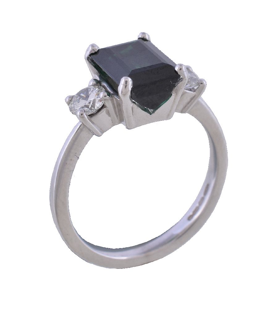 An 18 carat gold green tourmaline and diamond ring, the central rectangular cut green tourmaline
