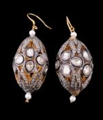 A pair of diamond ear pendants, the pierced drops set with table cut and eight cut diamonds, set