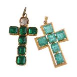 An emerald cross brooch, set with square cut and rectangular cut emeralds, within a polished gold