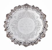 A Victorian silver shaped circular salver by the Barnard Brothers, London 1852, with shell and