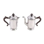 A pair of silver café au lait pots by Mappin & Webb, Birmingham 1928, with composition finials and