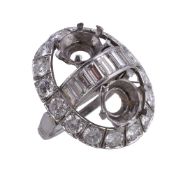 A diamond ring mount, the oval panel set with brilliant cut diamonds, with a central panel of