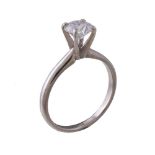 A single stone diamond ring, the brilliant cut diamond in a raised claw setting, estimated to