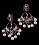 A pair of cultured pearl and diamond ear pendants, the circular panels set with polki diamonds,