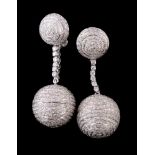 A pair of diamond ear pendants, the sphere set throughout with brilliant cut diamonds, suspended