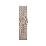 Movado, a lady's 18 carat white gold and diamond bracelet wristwatch