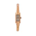 Baume & Mercier, an 18 carat gold bangle wristwatch