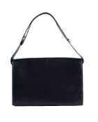 Alaia, a black leather satchel bag