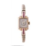 A lady's 9 carat gold and synthetic ruby dress watch