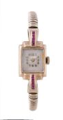 A lady's 9 carat gold and synthetic ruby dress watch