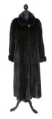 A full length dark mink fur coat by Saga