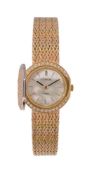 ϒ Corum, ref. 373885, a lady's gold and diamond bracelet wristwatch