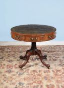 A George III mahogany drum library table