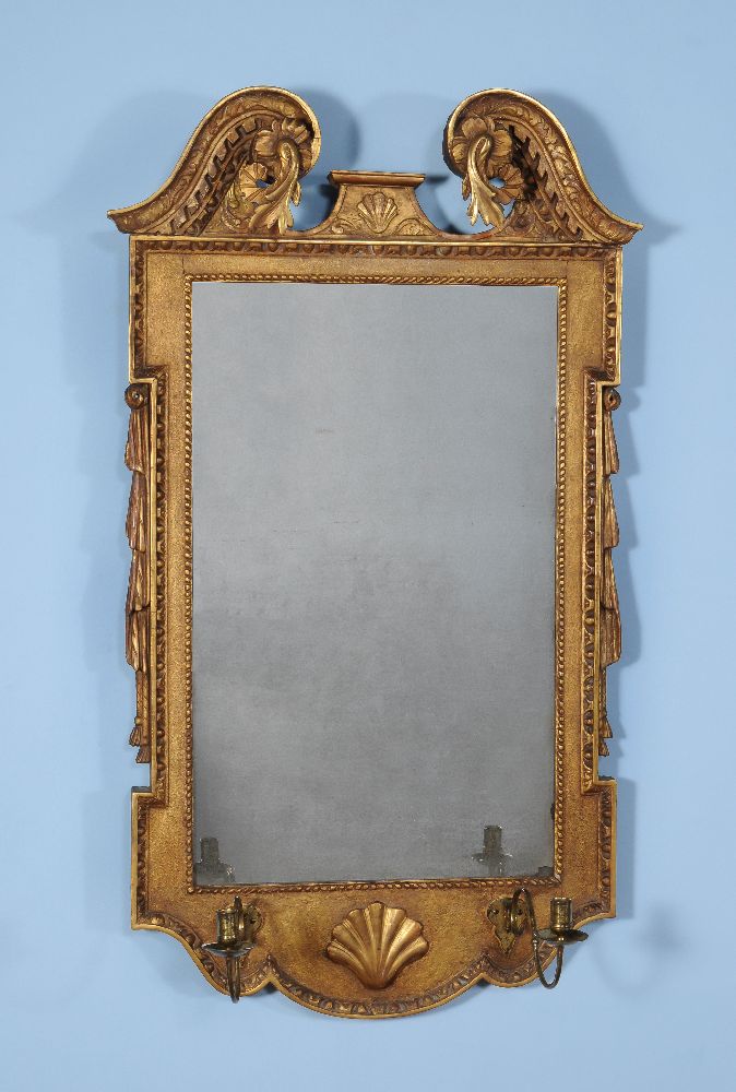 A George II giltwood and gesso girandole wall mirror