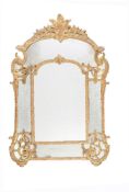 A Louis XV carved giltwood and gesso wall mirror