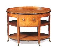 A George III satinwood, ebonised and gilt metal mounted oval 'rent' table