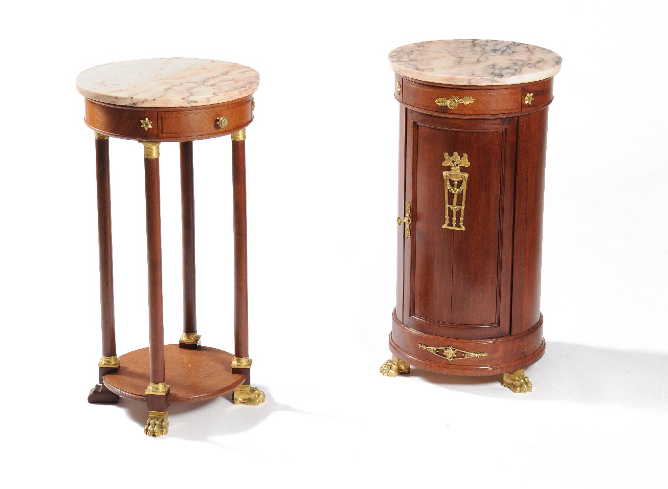 A pair of French mahogany and gilt metal mounted bedside tables, in Empire style