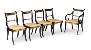 A set of ten Regency ebonised and parcel gilt dining chairs