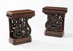 ϒ A pair of rosewood and gilt metal mounted console tables