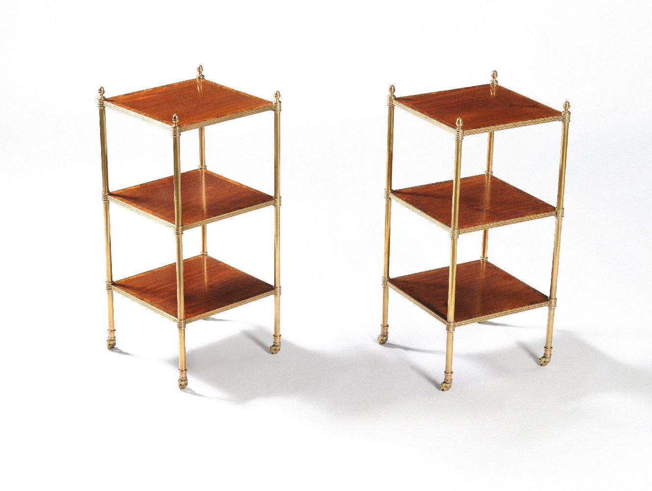 A pair of Victorian mahogany, thuya crossbanded and gilt brass three tier étagères