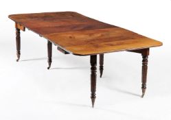 A William IV mahogany concertina action extending dining table