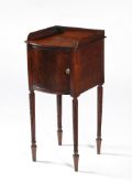 A Regency mahogany bowfront bedside cabinet