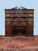 A George III mahogany breakfront library bookcase