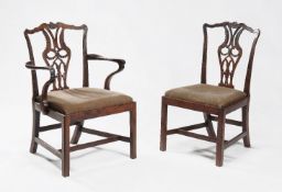 A set of nine George III mahogany dining chairs