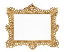 A carved giltwood wall mirror in George III style