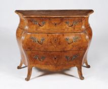 A pair of Continental figured walnut serpentine commodes